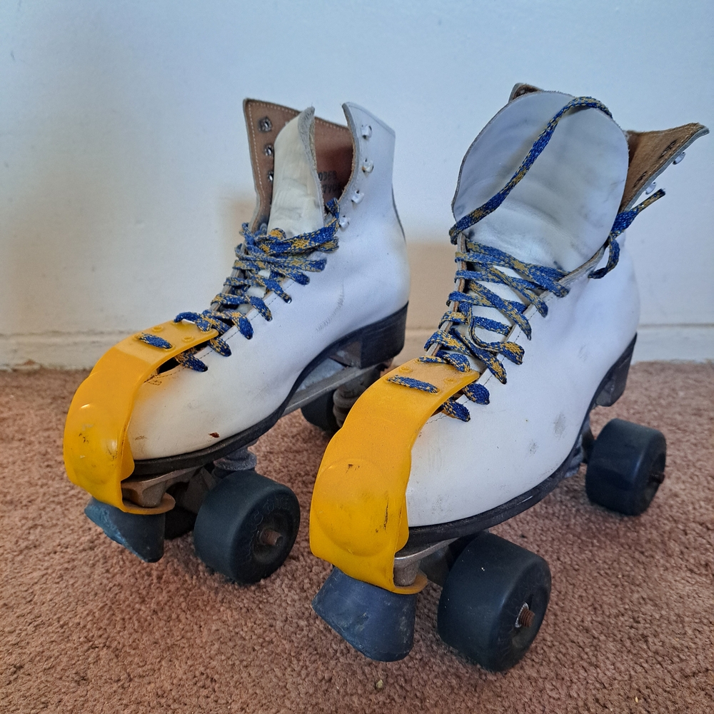 Vintage White Roller Skates with Yellow Toe Guards Sz 7